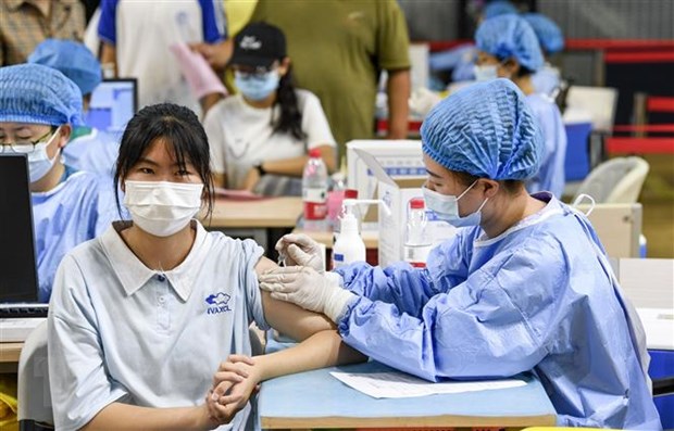 COVID-19: Trung Quốc có thể đạt miễn dịch cộng đồng vào cuối năm